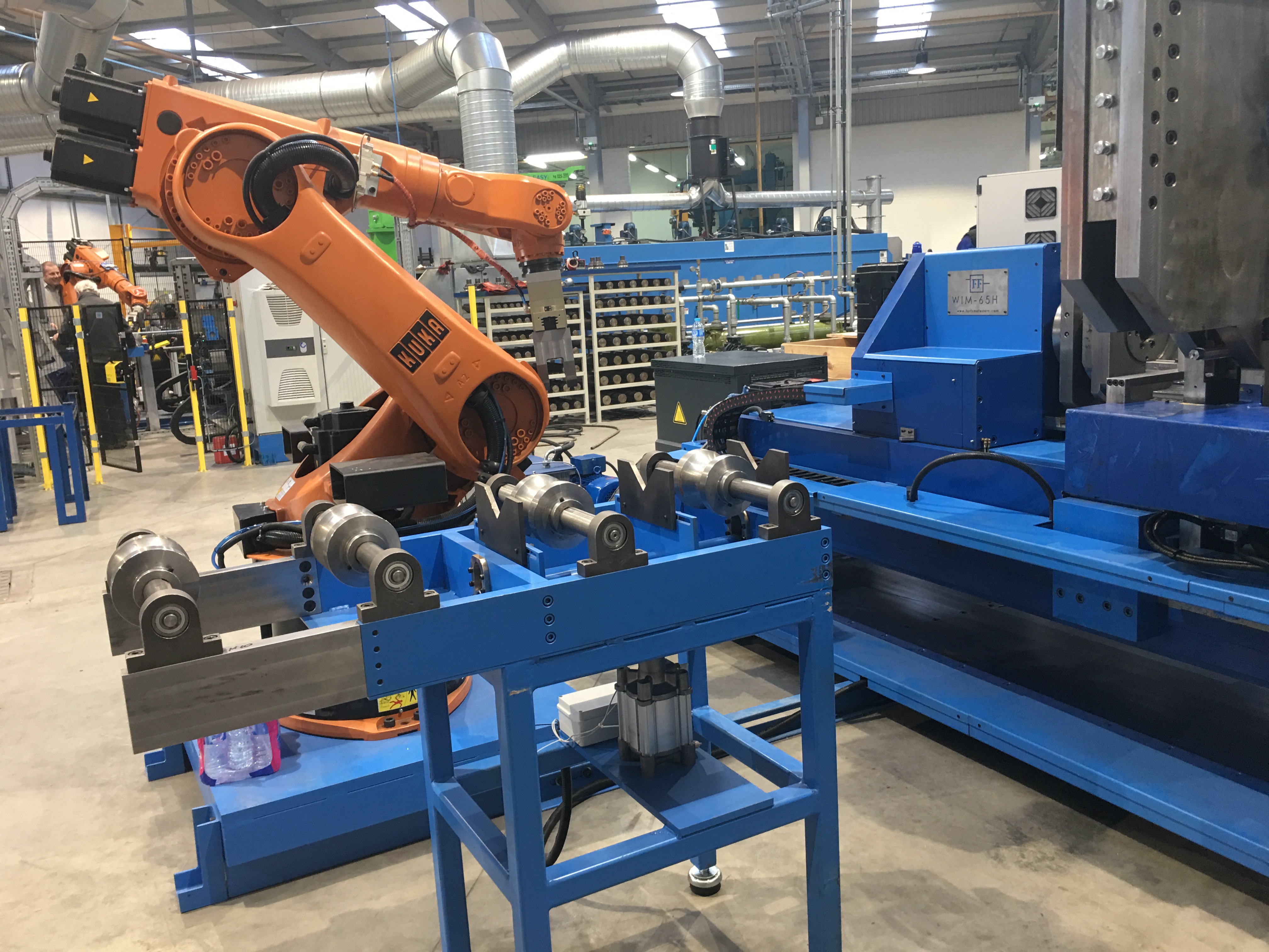 WIM-65H servo controlled lathe coiler for HOT coiling…